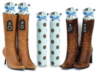 One Pair of 15-inch-tall fabric boot inserts covered in light blue fabric with brown polka dots and with black wooden tags reading "I Love You.” tied around the top of the insert. Any message can be written on the black wooden tags. And two pairs of boots with the boot tree inserts inside them keeping them upright.