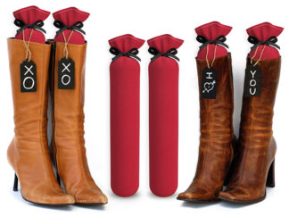 One Pair of 15-inch-tall fabric boot inserts covered in red fabric and with black wooden tags reading "I Love You.” tied around the top of the insert. Any message can be written on the black wooden tags. And two pairs of boots with the boot tree inserts inside them keeping them upright.